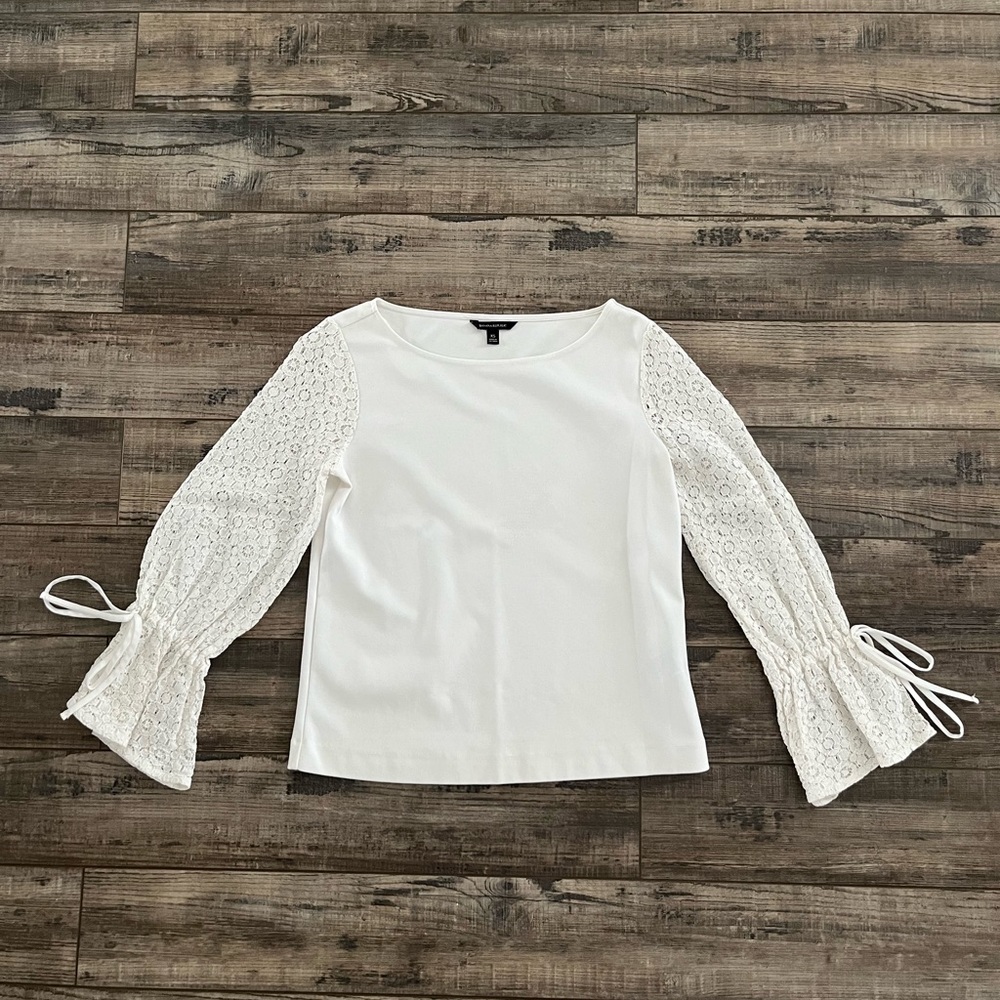 Long sleeve white blouse.